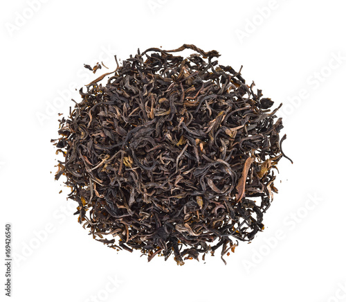 Top view of dried tea leaves on a white background.