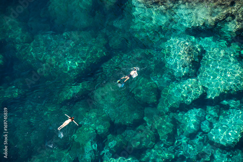 Couple snorkeling in the sea