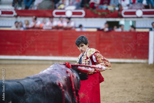 Bullfighter in a bullring.