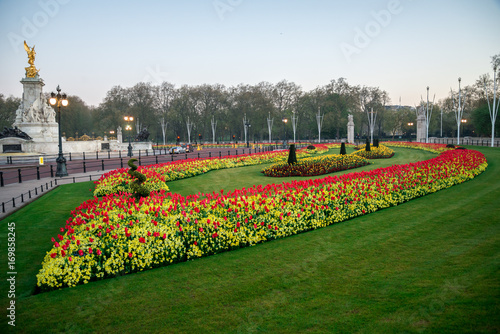 Flower-beds and Queen Victoria memorial near Buckingham Palace in London