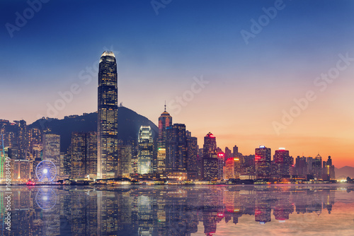 Hong Kong City Skyscraper Buildings and Business Financial District Central, Landmark Harbor View of Hong Kong City Skyline and Skyscrapers Cityscape Downtown at Sunset. Travel Sightseeing of HongKong