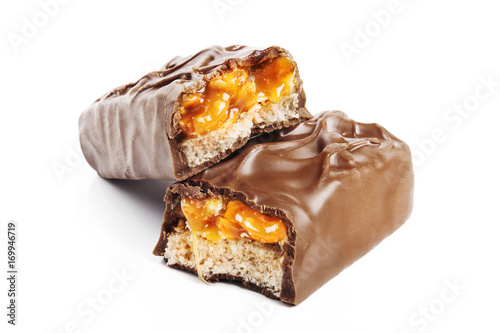 Closeup of chocolate,peanut and caramel bar isolated on white