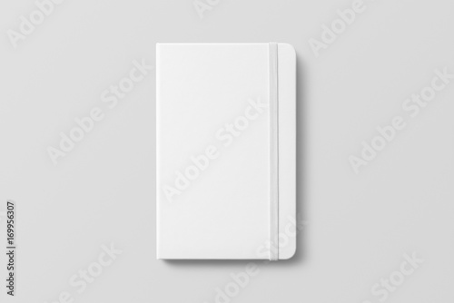 Blank photorealistic notebook mockup on light grey background. 