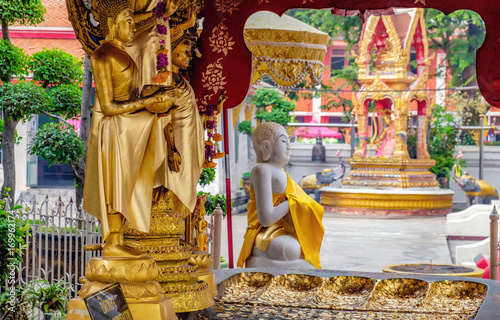 Decoration and Gold Buddha Statue in Buddhist temple Wat Chana Songkhram. It is located near popular street Khaosan road and district for tourists in Bangkok, Thailand