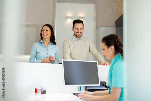 Patients consulting the dentist at dental clinic