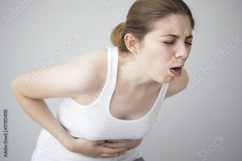 Young woman feeling nauseated