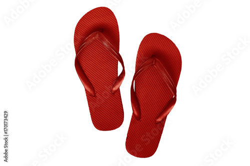 Red rubber flip flops, isolated on a white background