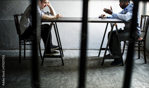 Officer interrogating offender criminal