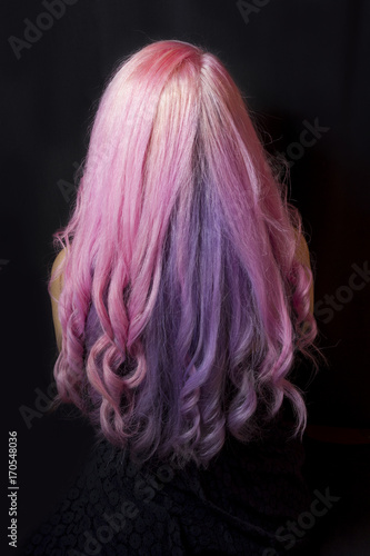 Rear view of pink hairstyle. Studio photography
