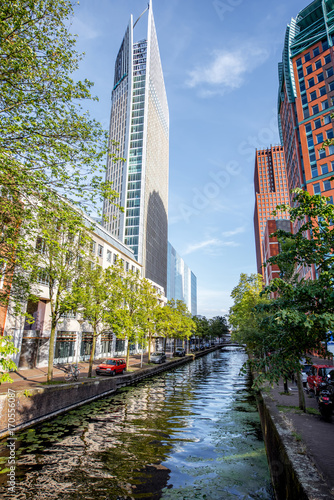 View on the water channel and beautiful skyscrapers in Haag city, Netherlands