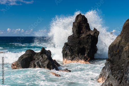Waves breaking at a Rock on La Reunion