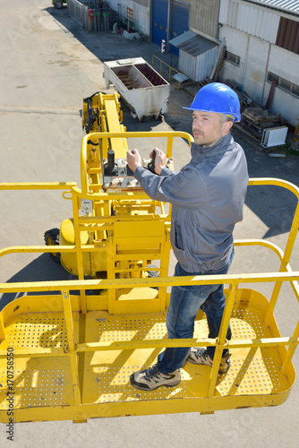 man working on nacelle