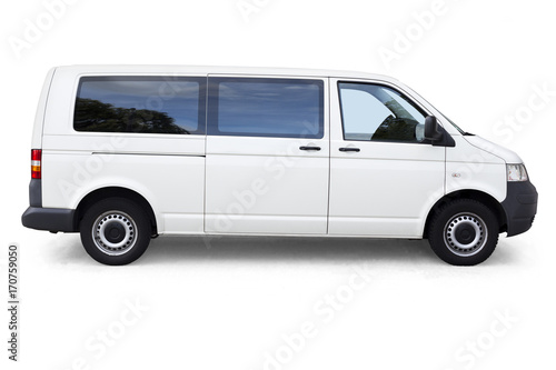 White van with windows on white background isolated with clipping path. White dropping shadow minivan on white