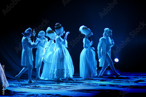 actors and Actresses dancing in white period costumes