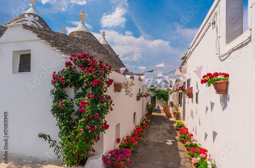 Alberobello (Italy) - The incredible little white town in Apulia region, province of Bari, southern Italy, famous for its unique trulli buildings. Here the historic center in a summer day