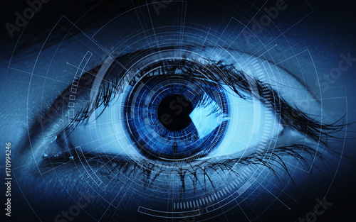 Close up of woman eye in process of scanning. Identification Business Internet Technology Concept