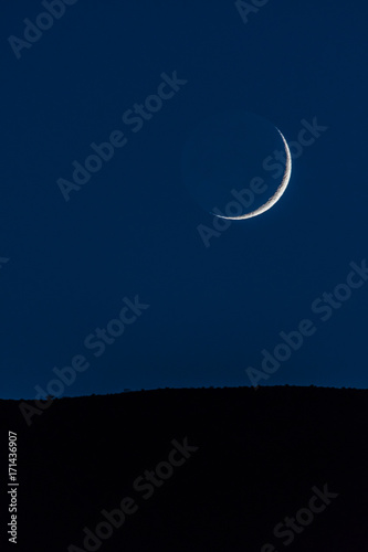 Waxing Crescent Moon Over Mountain