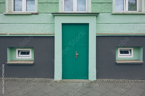 green door on facade