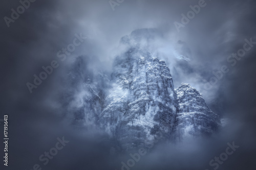 Moody weather around mountain peaks in Tyrol