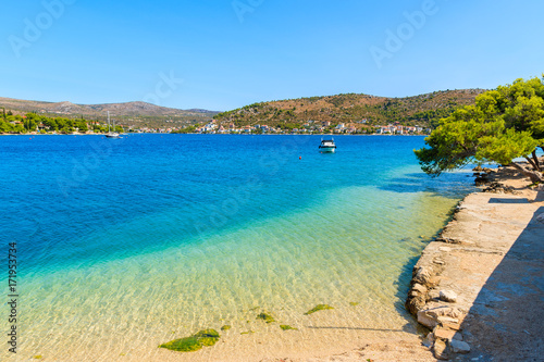 Beach view with turquoise crystal clear sea water in Rogoznica town, Dalmatia, Croatia