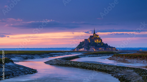 Panoramic view of famous Le Mont Saint-Michel tidal island at sunset, Normandy, northern France