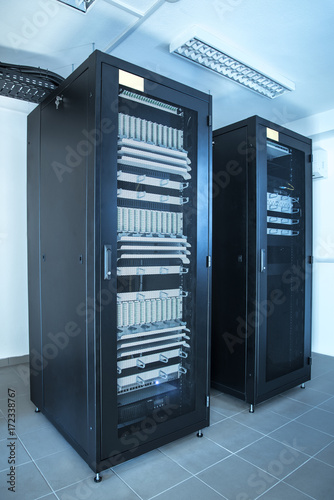 Closeup photo of a rack cabinet in server room