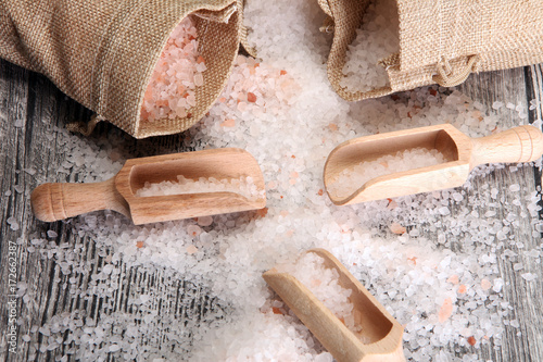 sea salt and himalayan in burlap. Crystals of salt on table