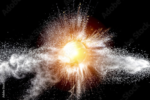 explosion of a glass sphere containing fragments of various kinds. high speed photography. concept of power and fragility. nobody around.