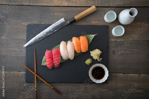 sushi platter with sashimi knife