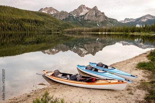 Three small boats on Stanley Lake Idaho in summer