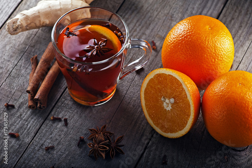 hot tea with spices and oranges