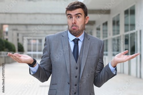 Businessman with "I have no idea" expression