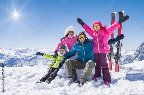 Happy family in winter holiday