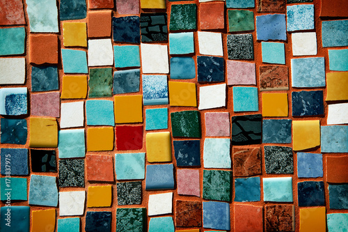 mosaic with colored tiles on a wall