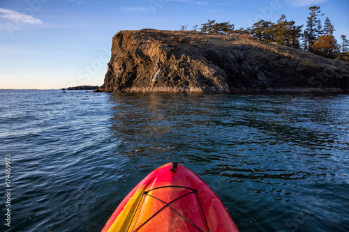 Paddle Boarding around Deception Pass, Washington, USA. Picture taken during a winter sunset.