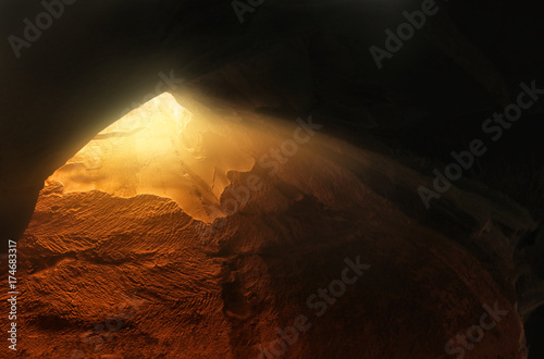 Abstract and surrealistic image of cave with light. revelation and open the door, Holy Bible story concept