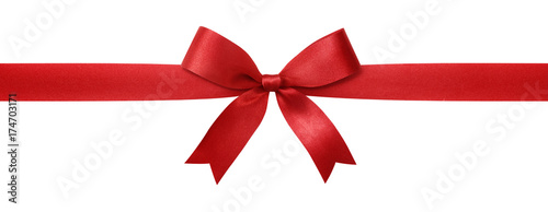 Red ribbon with bow isolated on white background.