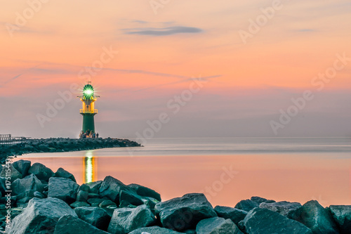 night view of lighthouse of Warnemuende on the Baltic Sea at the
