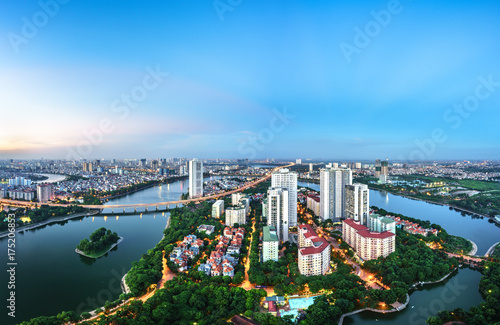 Aerial skyline view of Hanoi cityscape at twilight. Linh Dam peninsula, Hoang Mai district, Hanoi, Vietnam