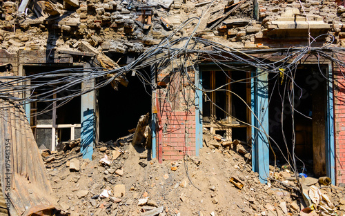 Aftermath of Nepal earthquake 2015, partially collapsed house in Kathmandu