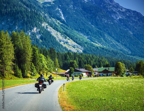 Motorcyclists on mountainous road