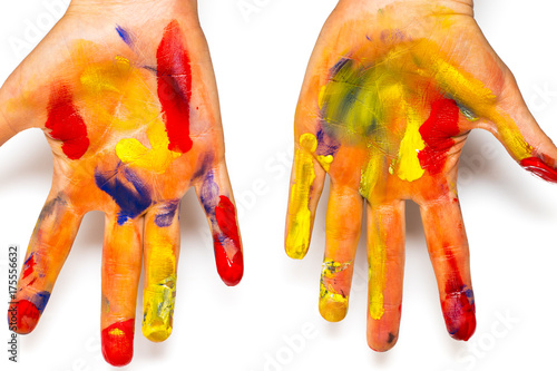 Girl hands in paint isolated on white, closeup