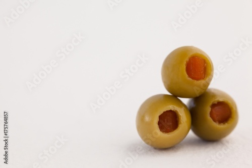 Close up of olives arranged on table