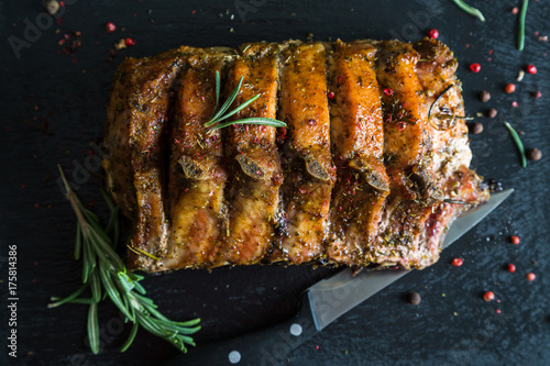 Pork loin on bone baked with herbs