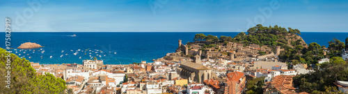 Panorama of the town of Tossa de mar one of the most beautiful towns on the Costa Brava. City walls and medieval castle on the hill.