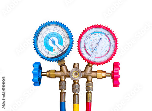 Air Conditioning Refrigerant, Pressure Gauges set isolate on white background. R134a R12 R22 AC Refrigeration charging A/C manifold dual gauge tester. Tools for Air Refill Kits. - Selective focus.