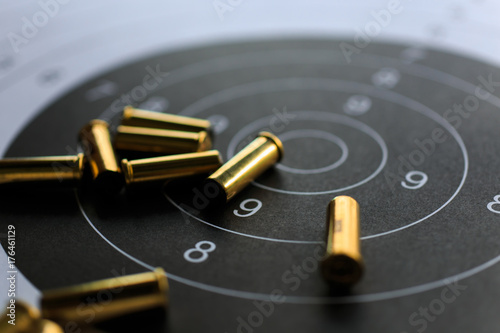 bullets on paper target for shooting practice