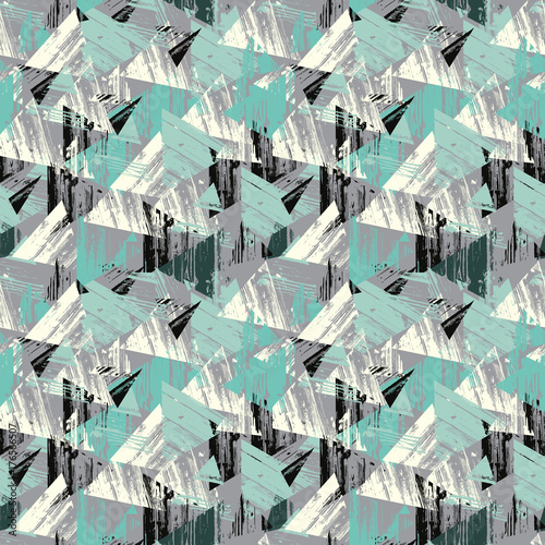 Triangular seamless background. Seamless geometric pattern.