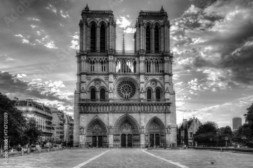 Notre Dame cathedral in Paris, France, at sunrise. Scenic skyline. Travel background.