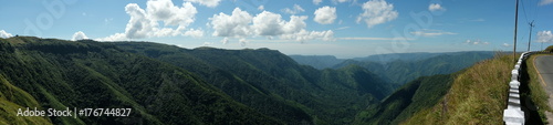 Panoramic view of mountain valleys and road